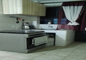 Apartment, 1 Bedroom | Private kitchen | Fridge