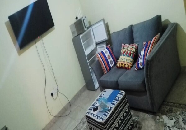 Appartement, 1 chambre | Aire de séjour
