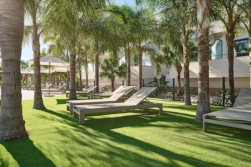 Seasonal outdoor pool, open 10:00 AM to 8:30 PM, pool umbrellas