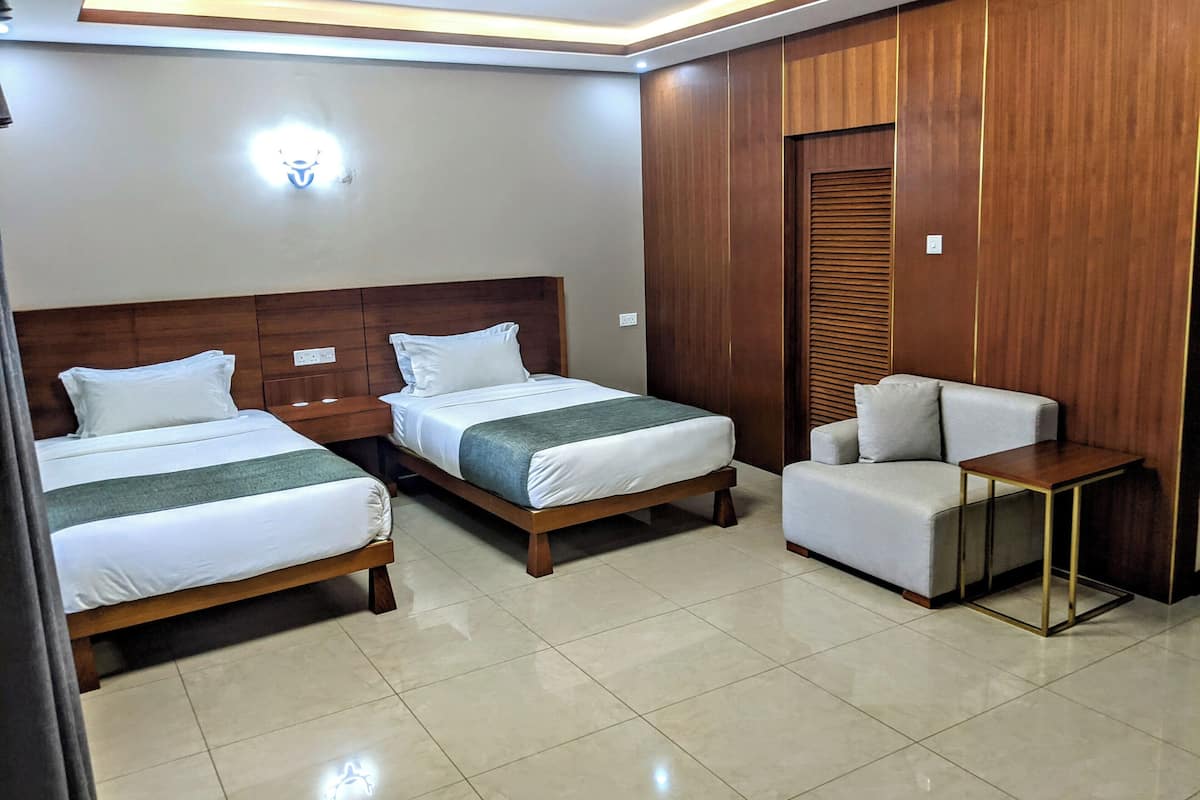 Premium bedding, pillow-top beds, desk, laptop workspace