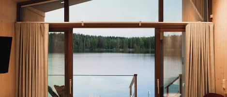 Premium Studio Suite, Lake View | Desk, laptop workspace, blackout drapes, soundproofing