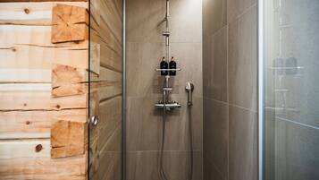 Premium Studio Suite, Lake View | Bathroom | Hair dryer, towels, soap, shampoo