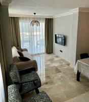 Family Apartment (1+1) | Living area | TV