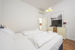 Desk, free WiFi, bed sheets