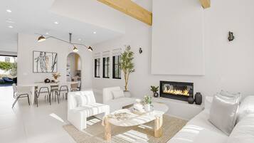 Luxury Villa, Multiple Beds, Pool Access, Pool View (Villa Camellia) | Living area | 65-inch flat-screen TV with digital channels, fireplace