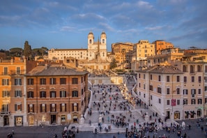 A historic square with a prominent staircase leading to a church with two towers. - The Inn at the Spanish Steps Luxury Collection -The View (Rome)