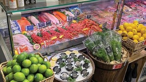 A seafood display with various fresh fish and seafood, including shrimp and lobster, priced at $29.95 and $34.95. - Architect-Designed Studio Retreat in Prime South Hobart (South Hobart)