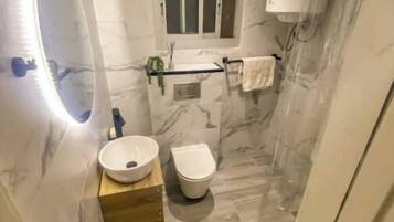 Hair dryer, towels, soap, shampoo