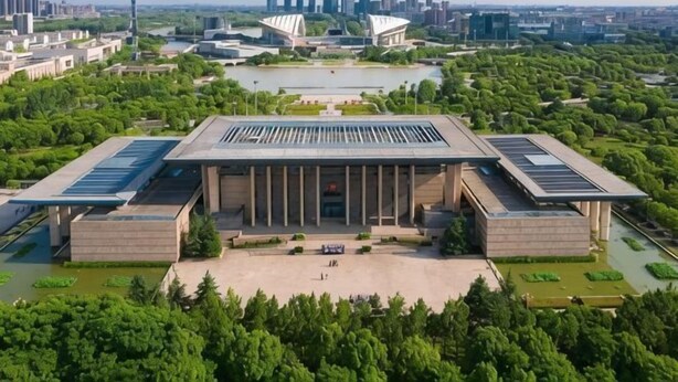 A large building with a central courtyard, surrounded by greenery and water features. - GYA Hotel (Jiaxing Nanhu Scenic Area Nanhu Tiandi) (Jiaxing)