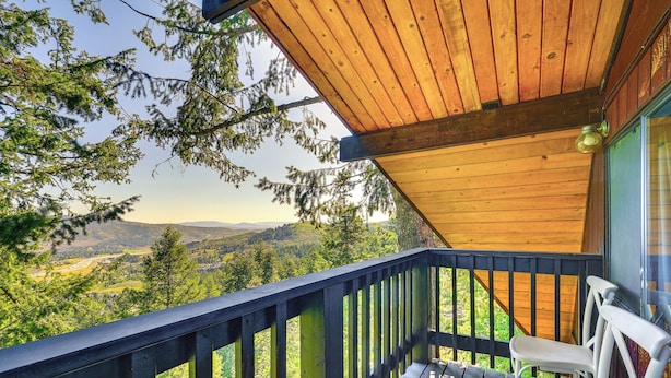 A wooden deck with a view of a mountainous landscape. - 3 Mi to Ski Slopes: Park City Retreat w/ Game Room (Park City)