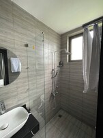 Shower, slippers, towels, shampoo