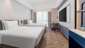 A hotel room with two beds, a desk, a chair, a TV, and a window with curtains. - Holiday Inn Express Chengdu Shuangliu Airport (Chengdu)