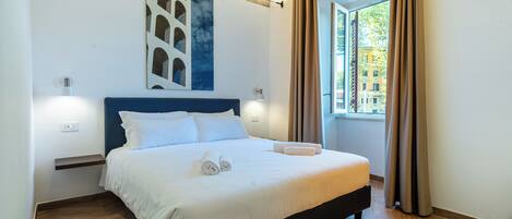 Family Studio, City View | Minibar, in-room safe, desk, laptop workspace