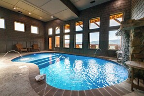 Indoor pool, a heated pool - *Luxurious 5BD Lodge w/ POOL! Hot Tub + Theater!* (Sevierville)