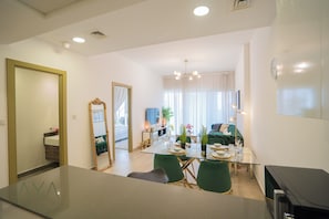 Deluxe Apartment, Balcony, City View | Living area - Aya - Elegant 1BR Retreat In The Heart Of JVC (Dubai)