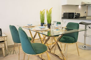 Deluxe Apartment, Balcony, City View | Dining room - Aya - Elegant 1BR Retreat In The Heart Of JVC (Dubai)