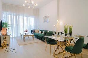 Deluxe Apartment, Balcony, City View | Living area - Aya - Elegant 1BR Retreat In The Heart Of JVC (Dubai)