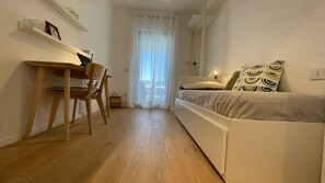 2 quartos, escrivaninha, Wi-Fi de cortesia, roupa de cama