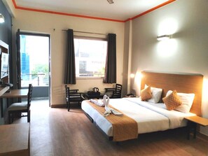 Deluxe Room, Balcony, City View | In-room safe, desk, laptop workspace, blackout curtains - hotel noida express (Noida)