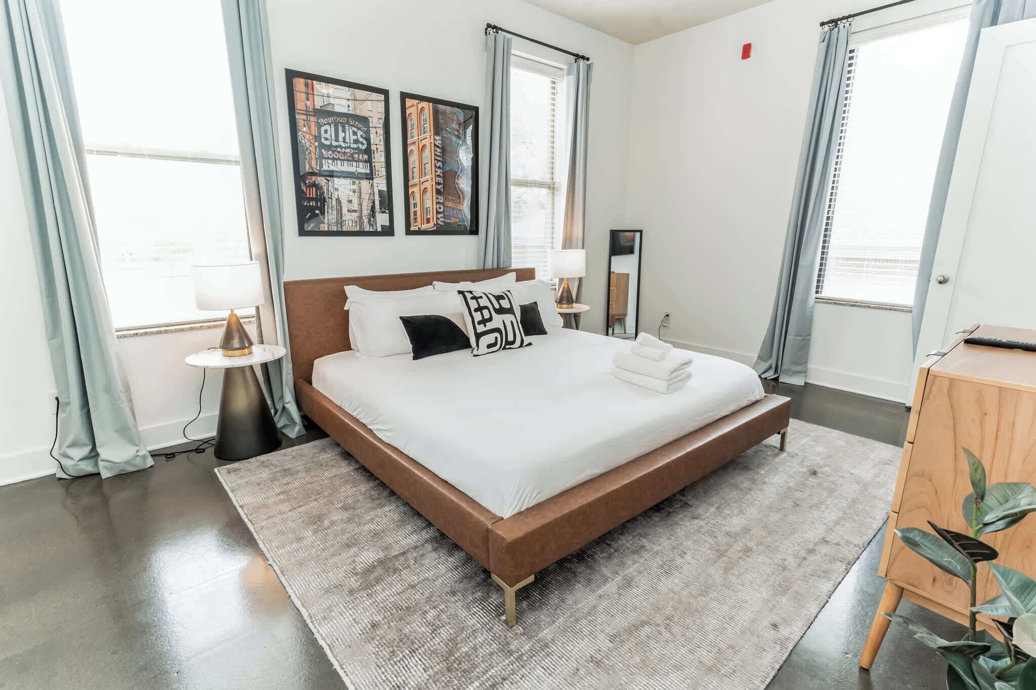 Bedroom with king bed with Smart TV, and ensuite