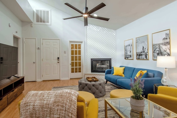 Stylish living room with Smart TV, gas fireplace and comfortable seating