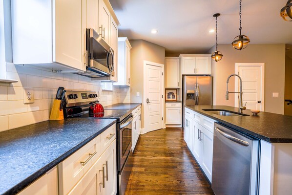 Fridge, microwave, oven, stovetop - Side by Side Townhomes in East Nashville (Nashville)