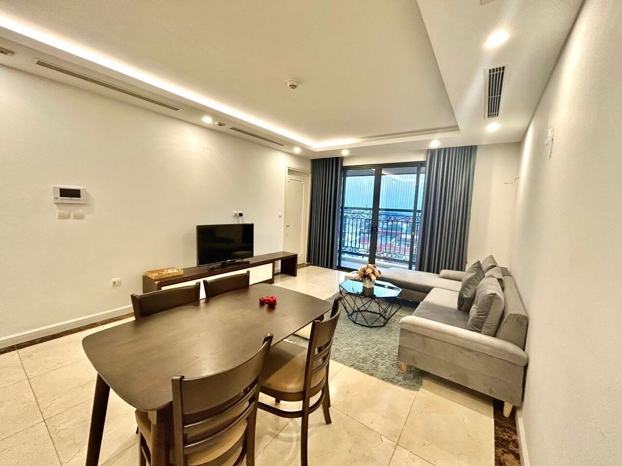 Deluxe Apartment, City View | Living area | TV