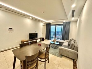Deluxe-Apartment, Stadtblick | Wohnbereich