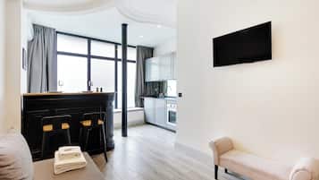 Comfort Apartment | Living area | TV