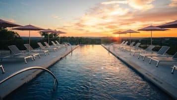 Outdoor pool, pool umbrellas, pool loungers