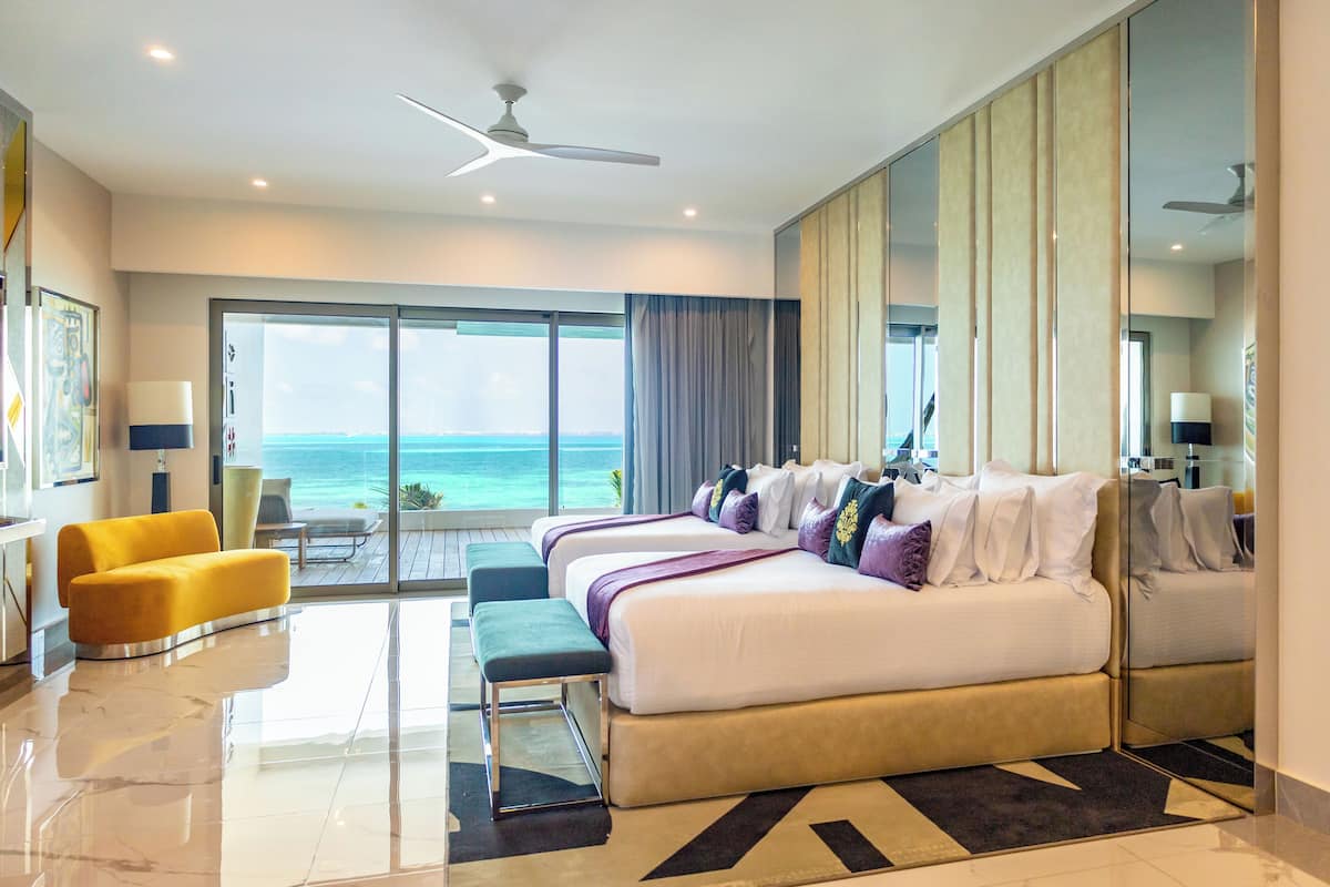Premium bedding, down comforters, minibar, in-room safe