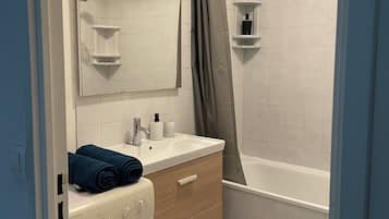 Hair dryer, towels, soap, shampoo