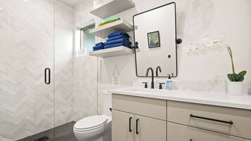 Hair dryer, towels, soap, toilet paper