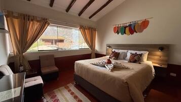 Habitación Deluxe, vistas al jardín | Edredones de plumas y colchones Select Comfort