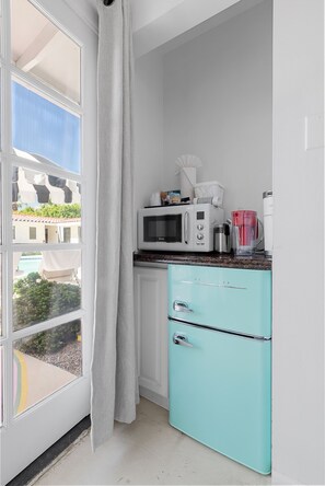 Mini-fridge, microwave, coffee/tea maker, toaster