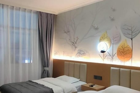 Room. Yiyun Hotel (Jinghong Gaozhuang Xingguang Night Market Branch, Xishuangbanna)