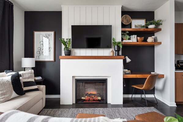 Smart TV, fireplace, books