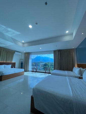 In-room safe, blackout curtains, iron/ironing board, free WiFi. Estela's Hotel and Event Center