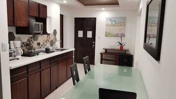 Family Apartment, City View | Private kitchen | Mini-fridge, microwave, oven, stovetop