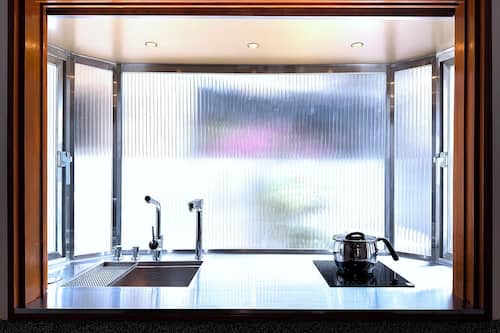 Mini-fridge, microwave, cookware/dishes/utensils