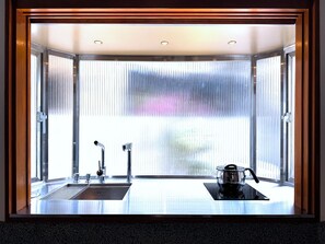 Mini-fridge, microwave, cookware/dishes/utensils