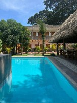 Outdoor pool, open 9:00 AM to 9:00 PM, sun loungers