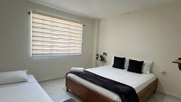 Basic Triple Room, Garden View | Free WiFi, bed sheets