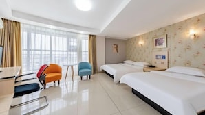 A hotel room with two beds, a desk, a chair, and a large window with curtains. - Inner Mongolia Too Western Coal Taixi Logistics Information (Alxa Left Banner)