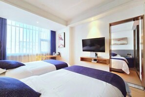A hotel room with two beds, a TV, a desk, and a large window. - Lanmei Boutique Hotel (Lanzhou Xiyuan) (Lanzhou)