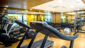 A gym with treadmills, elliptical machines, and weight equipment. - Winford Resort and Casino Manila (City of Manila)