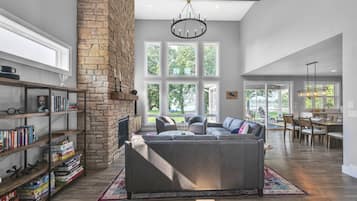 TV, fireplace, books