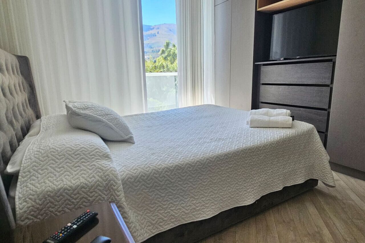 2 bedrooms, desk, iron/ironing board, travel cot