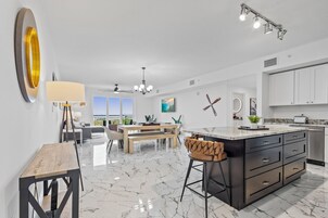 Luxury Condo | Private kitchen | Full-size fridge, microwave, oven, stovetop