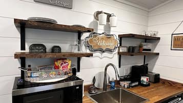 Fridge, microwave, coffee/tea maker, toaster